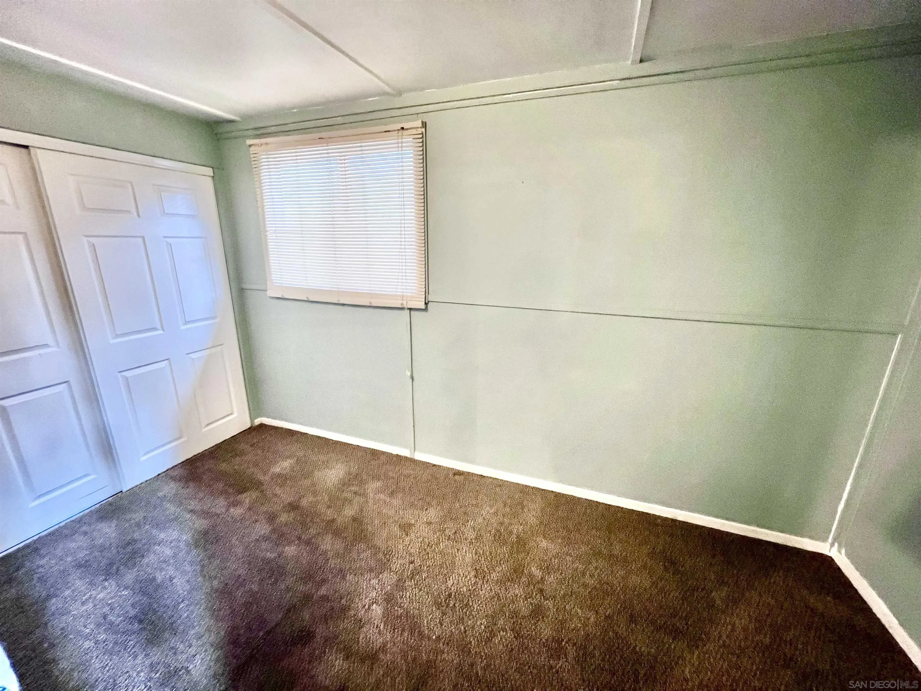 32500 Rincon Ranch Road Pauma Valley, CA 92061 - Photo 3 of 19 an empty room with a door