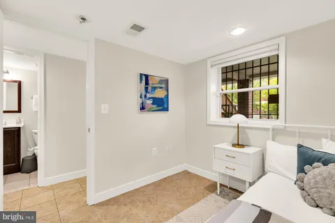 a living room with furniture and window