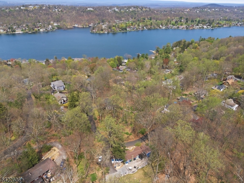399 Springbrook Trail Sparta, NJ 07871 - Photo 25 of 27 an aerial view of residential houses with outdoor space and lake view