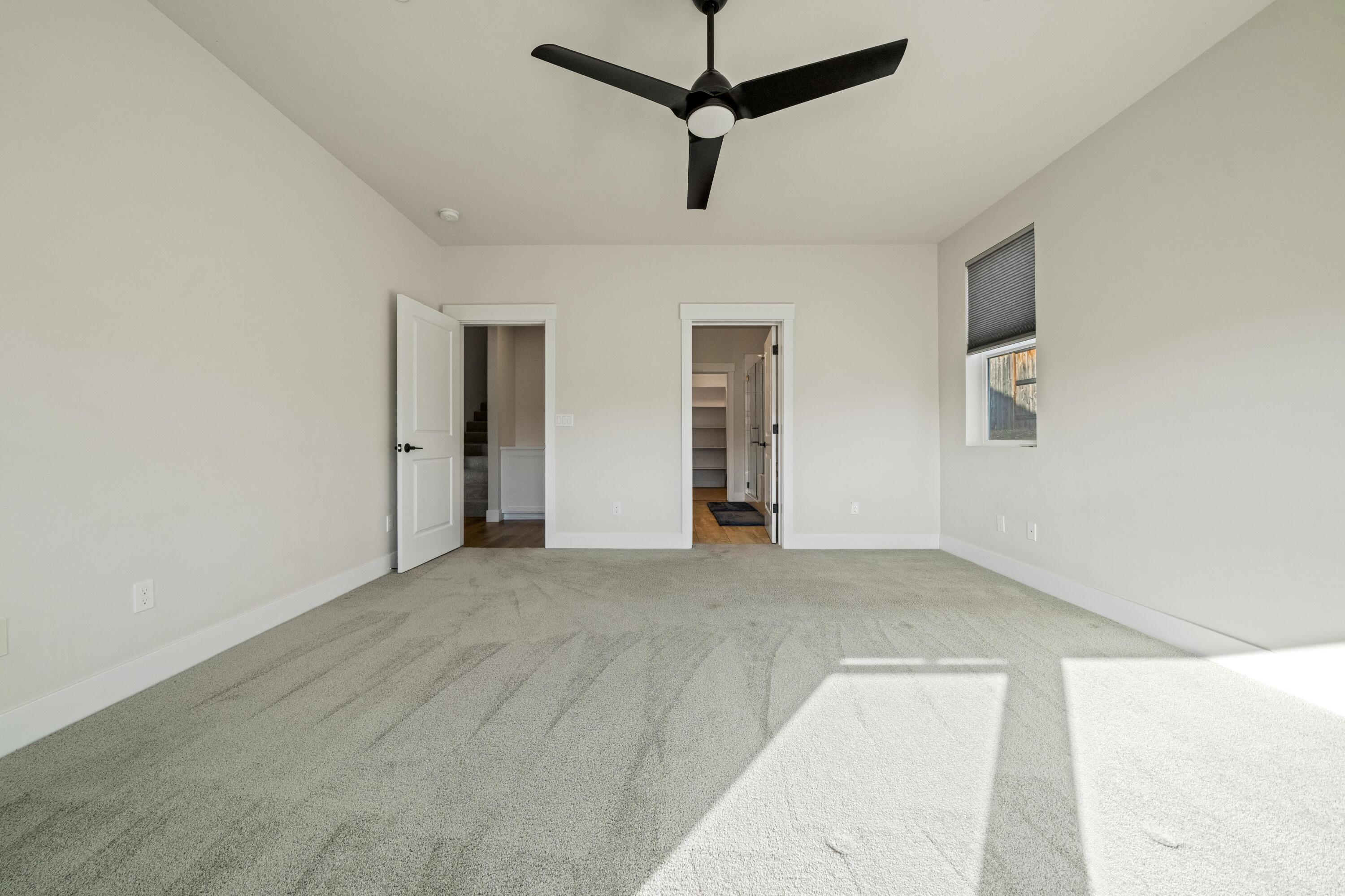 3001 Luke Trail Redding, CA 96002 - Photo 14 of 43 a view of a livingroom with a ceiling fan and window