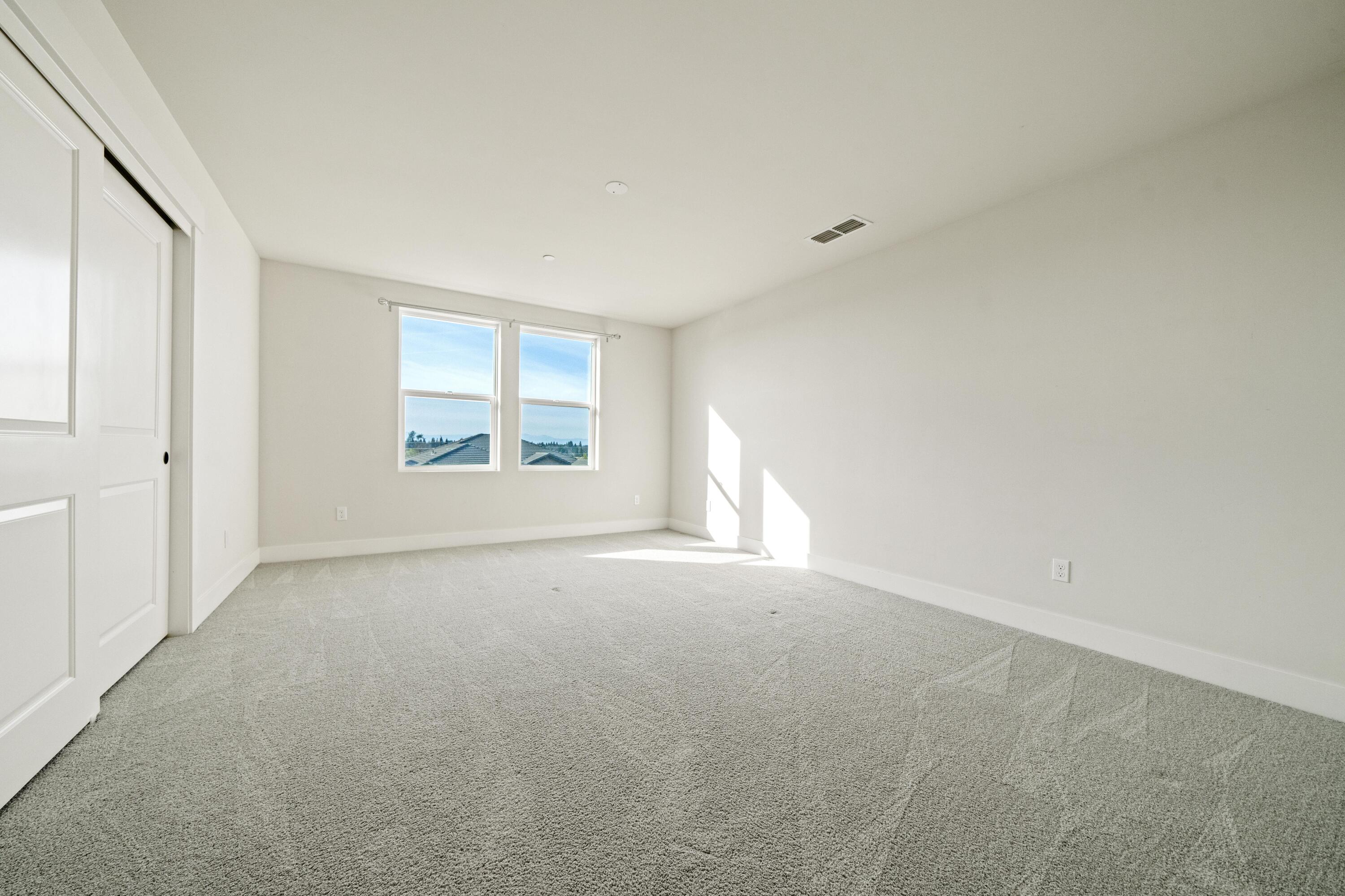 3001 Luke Trail Redding, CA 96002 - Photo 24 of 43 an empty room with windows