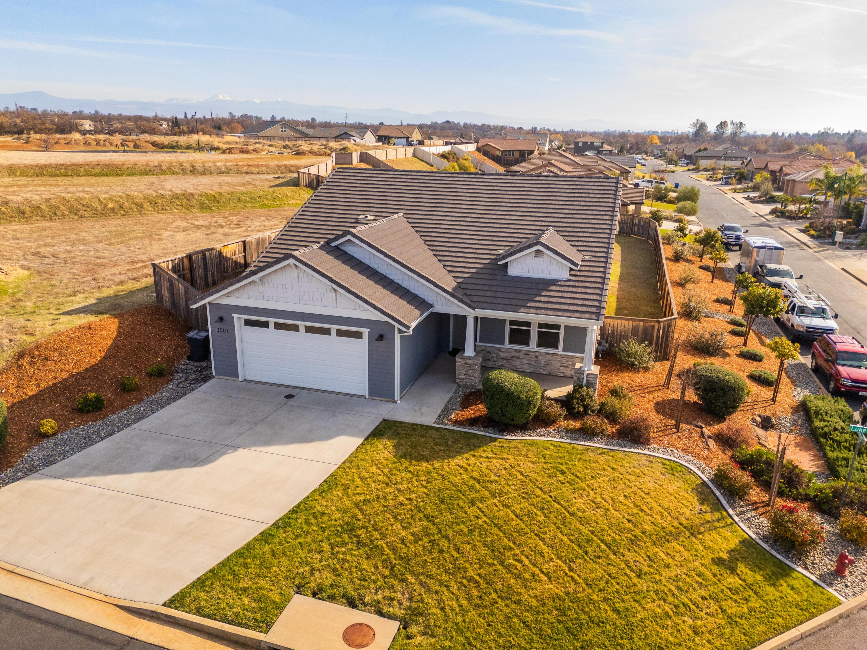 3001 Luke Trail Redding, CA 96002 - Photo 34 of 43 an aerial view of residential houses with outdoor space