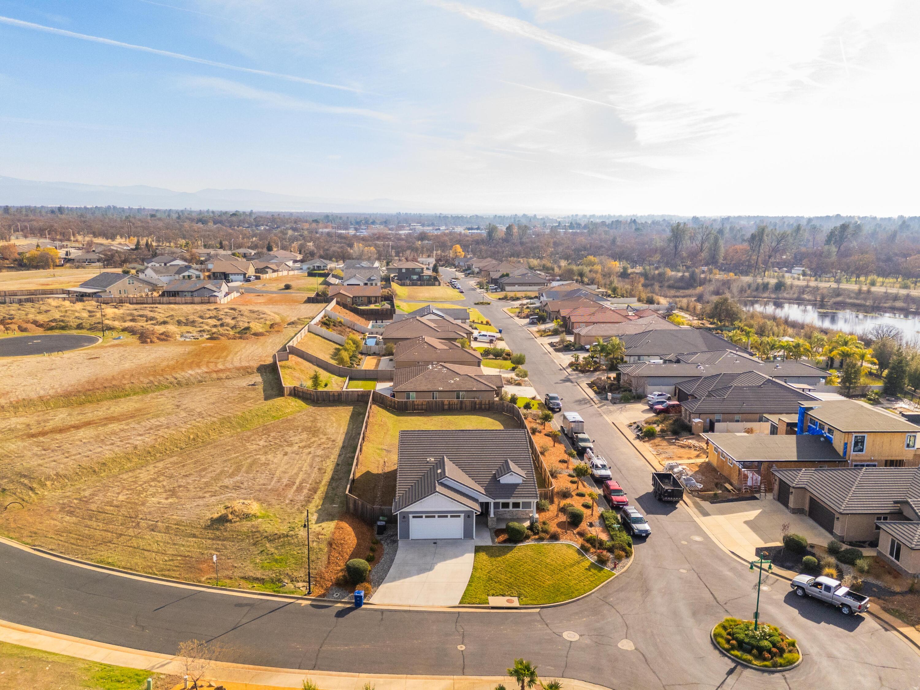 3001 Luke Trail Redding, CA 96002 - Photo 37 of 43 an aerial view of residential houses with outdoor space