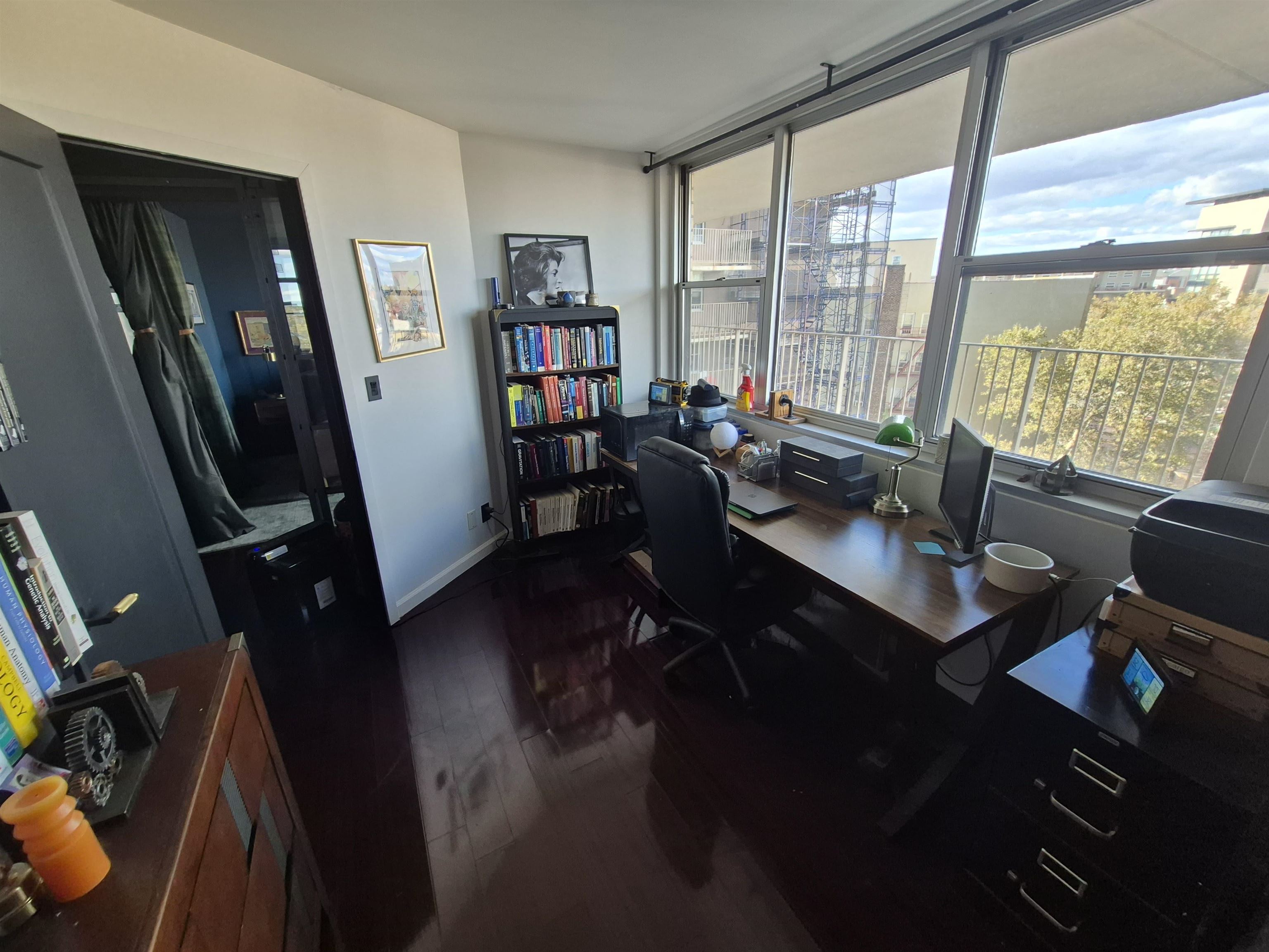 6040 Boulevard East, Unit 6B West New York, NJ 07093 - Photo 24 of 32 a work room with furniture and large windows