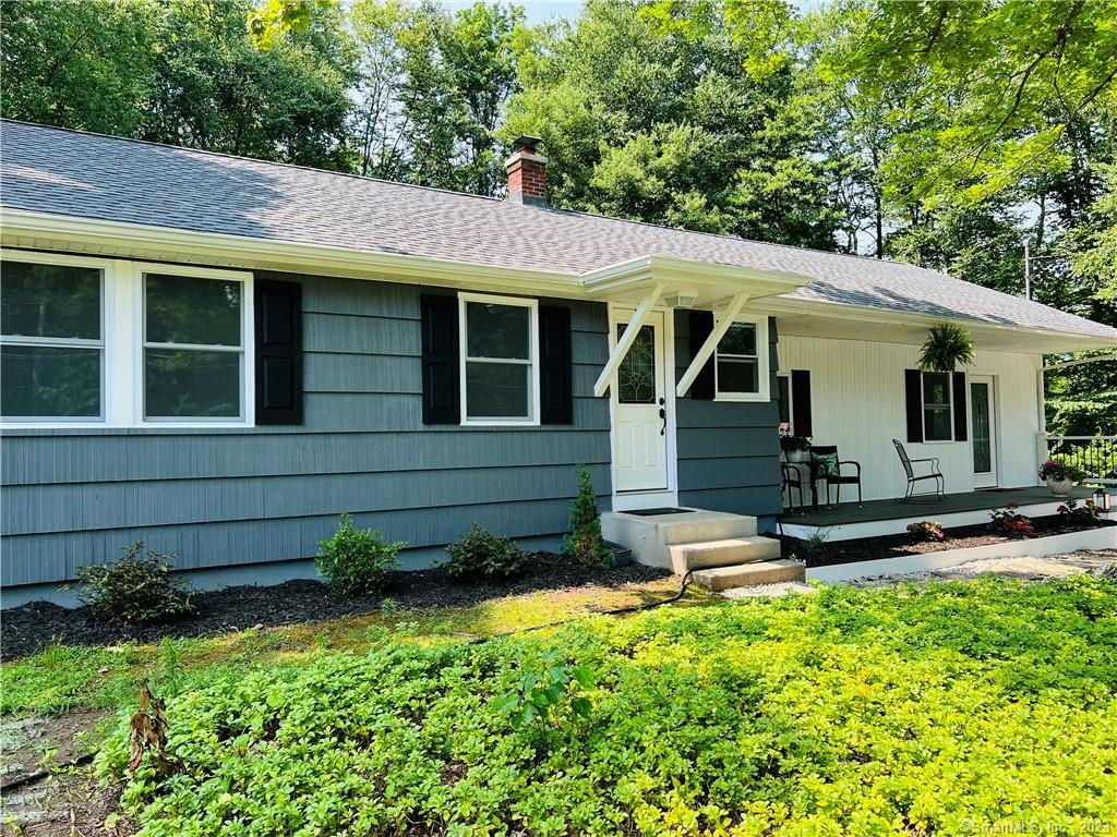 119 Windham Road Brooklyn, CT 06234 - Photo 1 of 1 a view of a house with backyard tub and garden