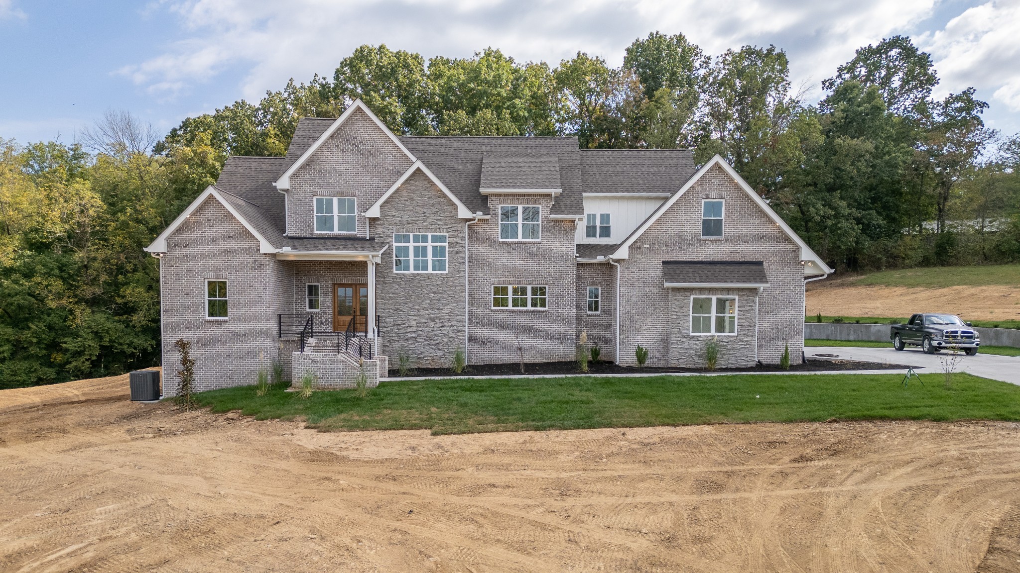 7039 Hall Road Greenbrier, TN 37073 - Photo 1 of 73 a front view of a house with a yard