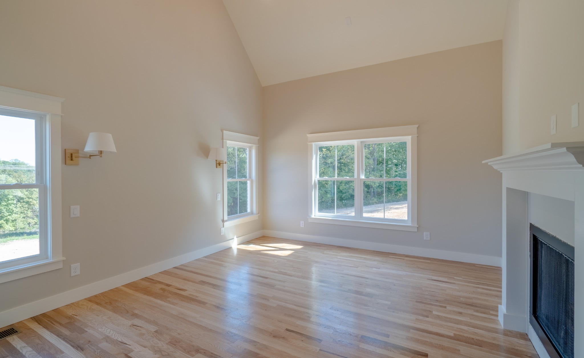7039 Hall Road Greenbrier, TN 37073 - Photo 21 of 73 an empty room with wooden floor and a window