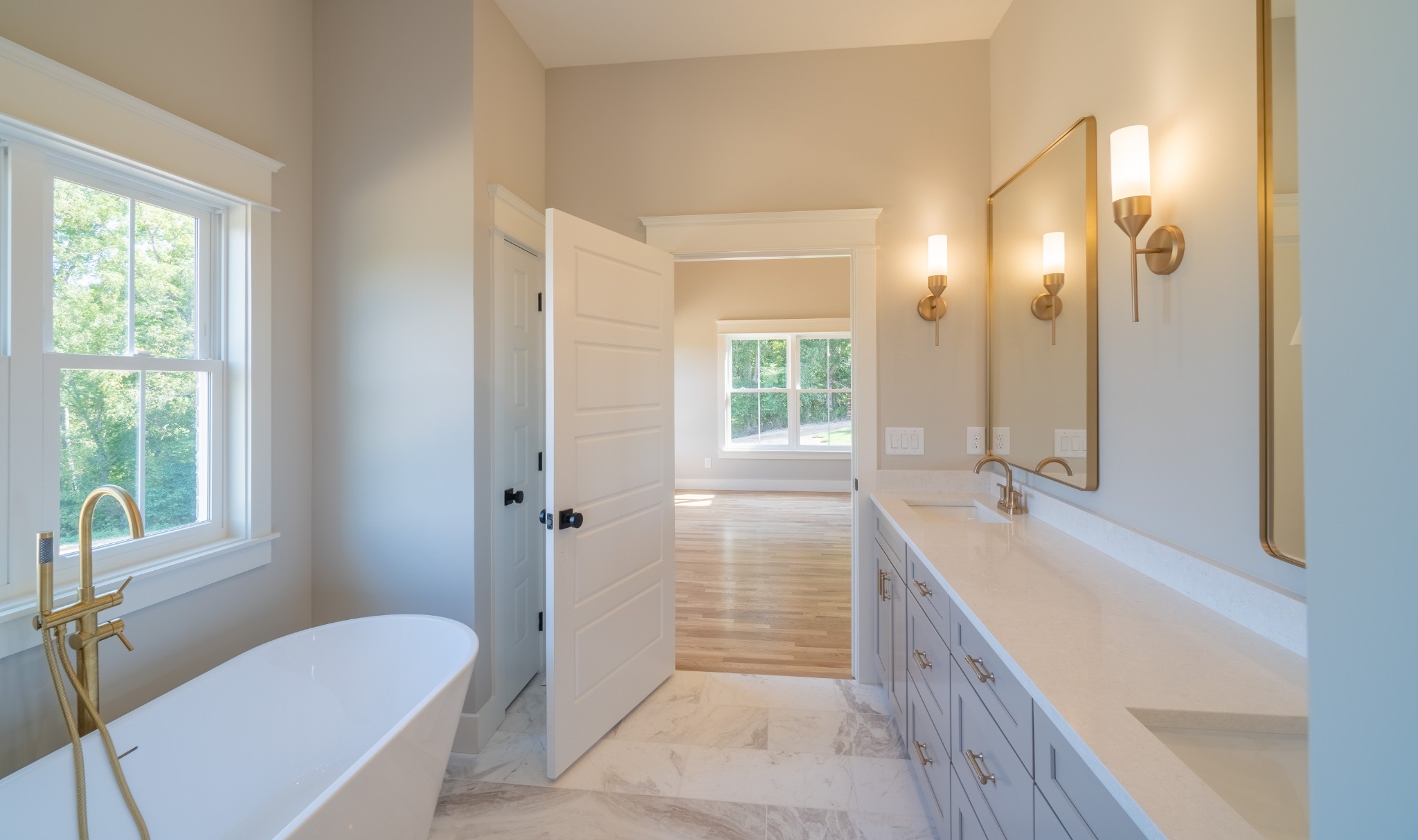 7039 Hall Road Greenbrier, TN 37073 - Photo 28 of 73 a bathroom with a granite countertop tub sink and mirror