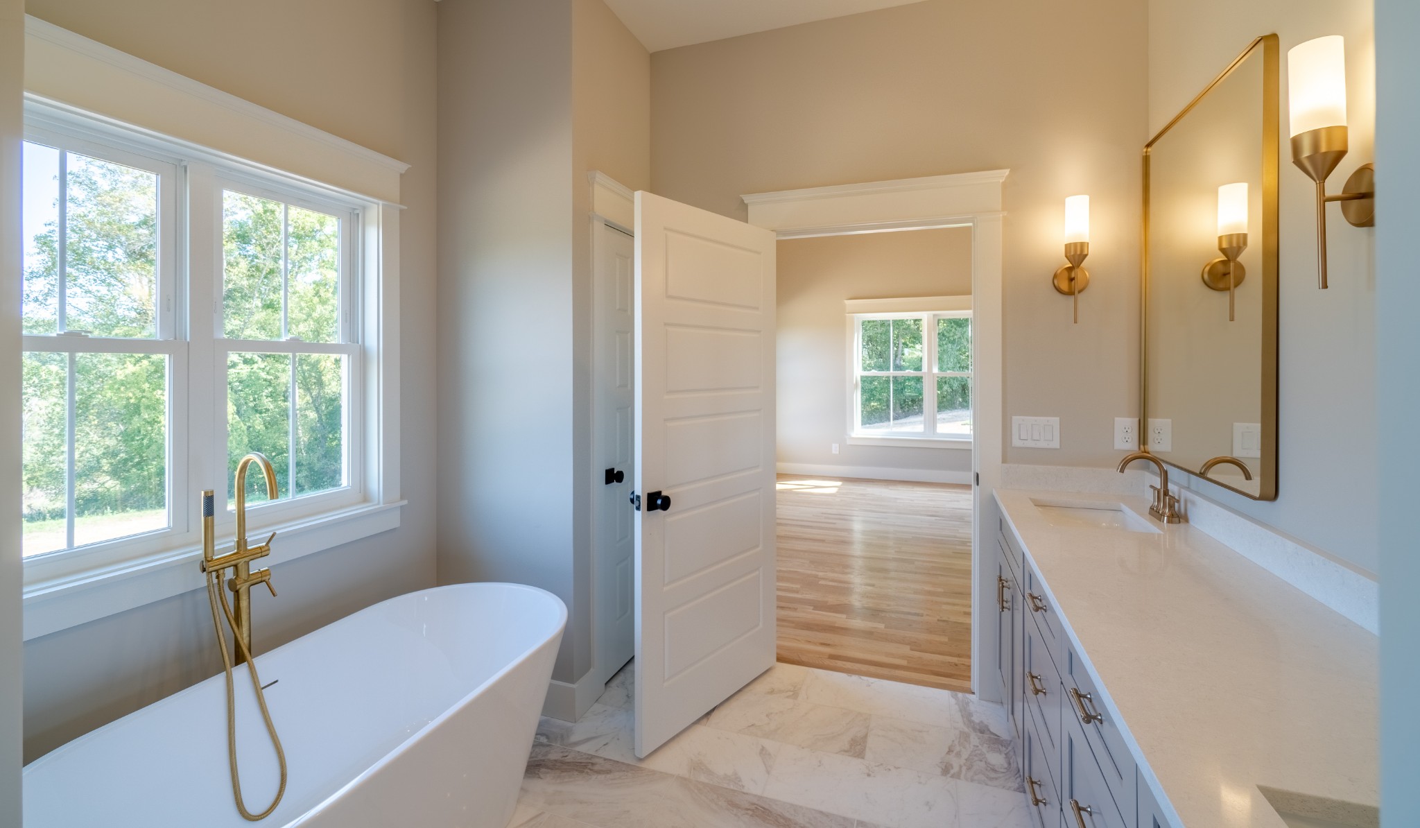 7039 Hall Road Greenbrier, TN 37073 - Photo 29 of 73 a bathroom with a tub sink and mirror