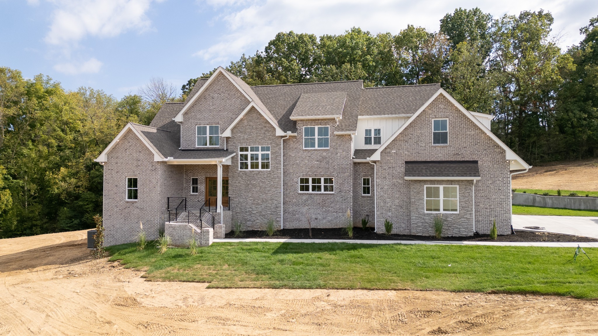 7039 Hall Road Greenbrier, TN 37073 - Photo 3 of 73 a front view of a house with garden
