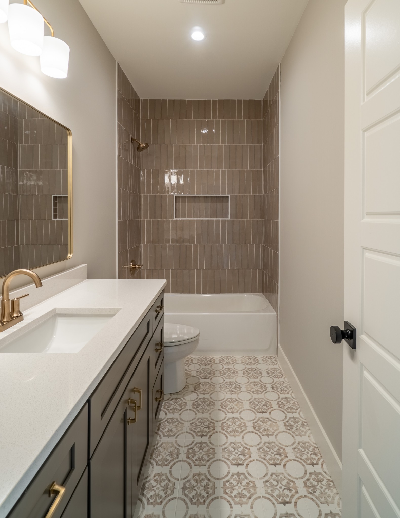 7039 Hall Road Greenbrier, TN 37073 - Photo 50 of 73 a bathroom with a sink a toilet a mirror and shower