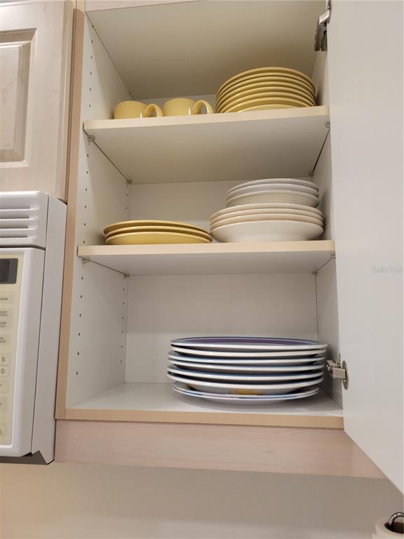 220 Santa Maria Street, Unit 442 Venice, FL 34285 - Photo 14 of 27 a bathroom with a sink and washing machine