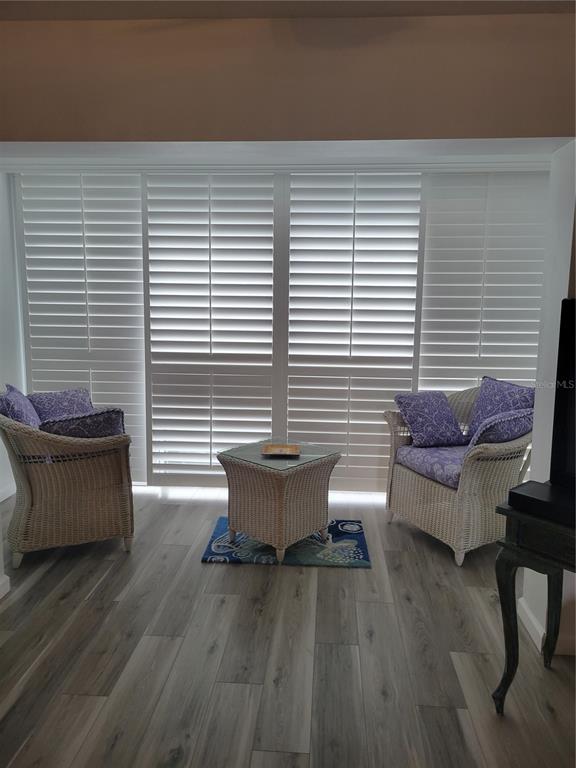 220 Santa Maria Street, Unit 442 Venice, FL 34285 - Photo 6 of 27 a view of a patio with couple of white walls