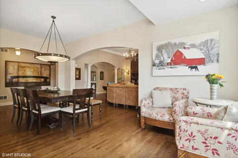 a living room with furniture fireplace and flat screen tv