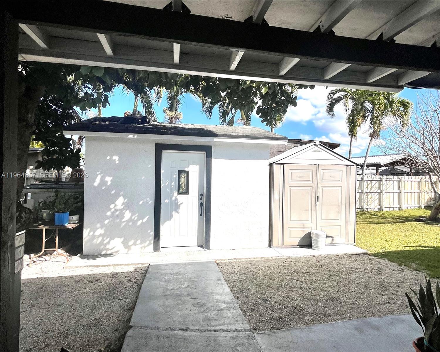 12271 Southwest 187th Street Miami, FL 33177 - Photo 25 of 27 a view of a entrance door of the house