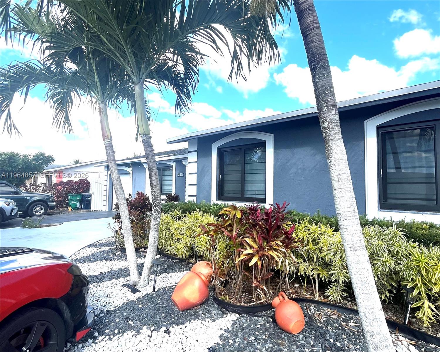 12271 Southwest 187th Street Miami, FL 33177 - Photo 3 of 27 a view of outdoor space yard and patio