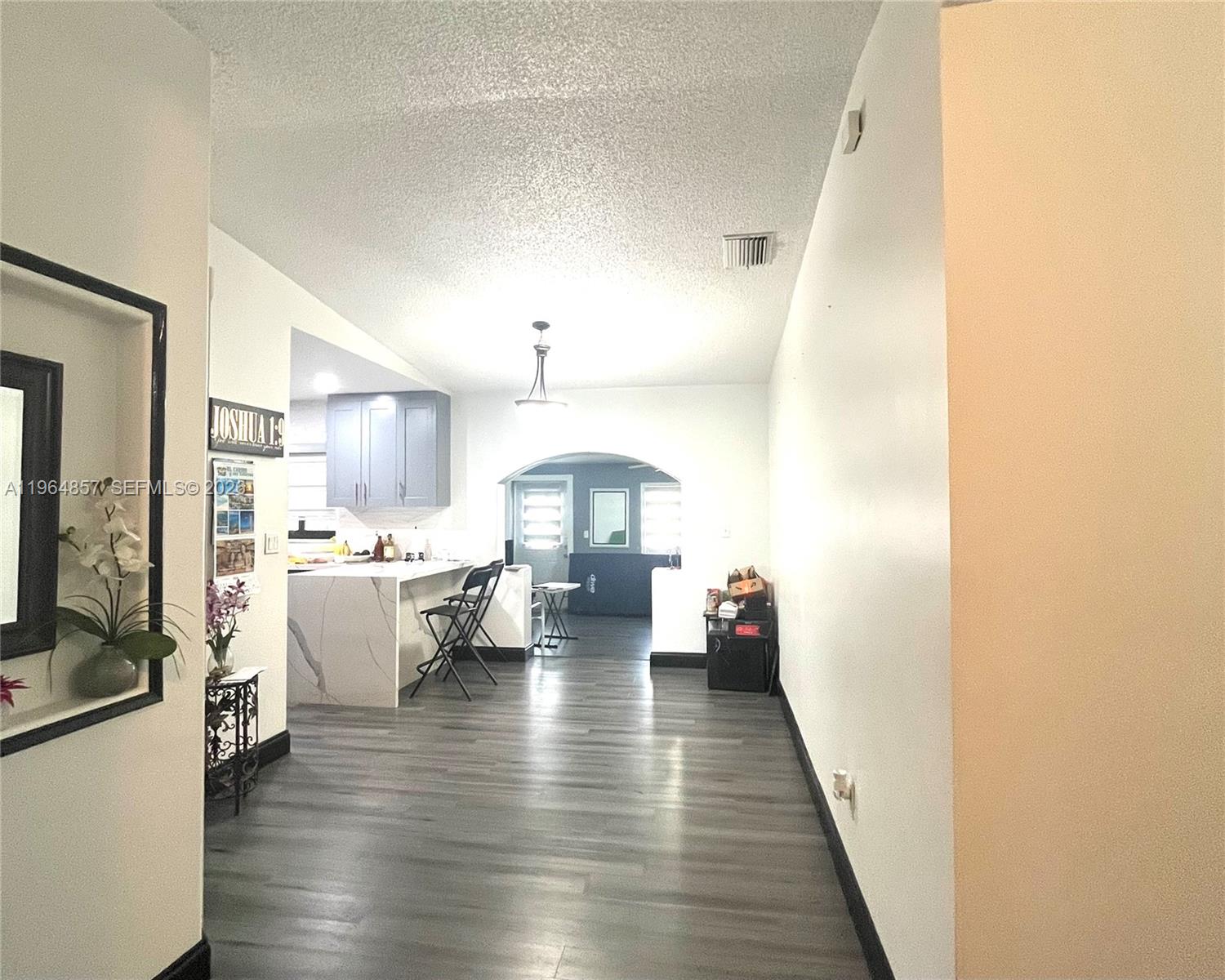 12271 Southwest 187th Street Miami, FL 33177 - Photo 4 of 27 a living room with furniture and a wooden floor