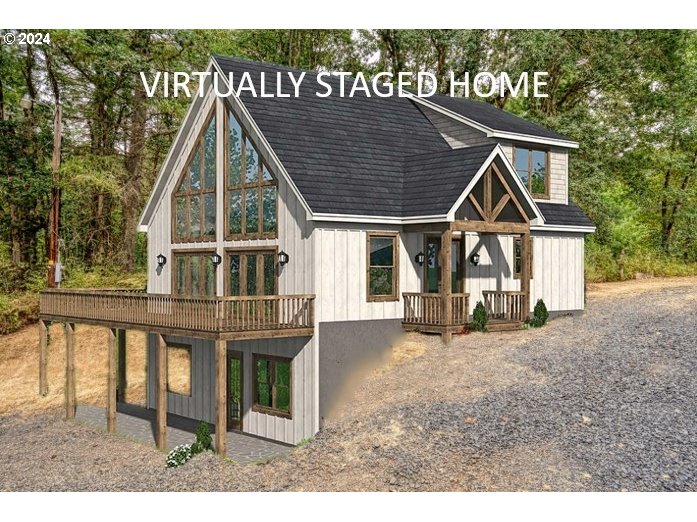 26720 Northwest Williams Canyon Road Gaston, OR 97119 - Photo 2 of 33 a front view of a house with a yard