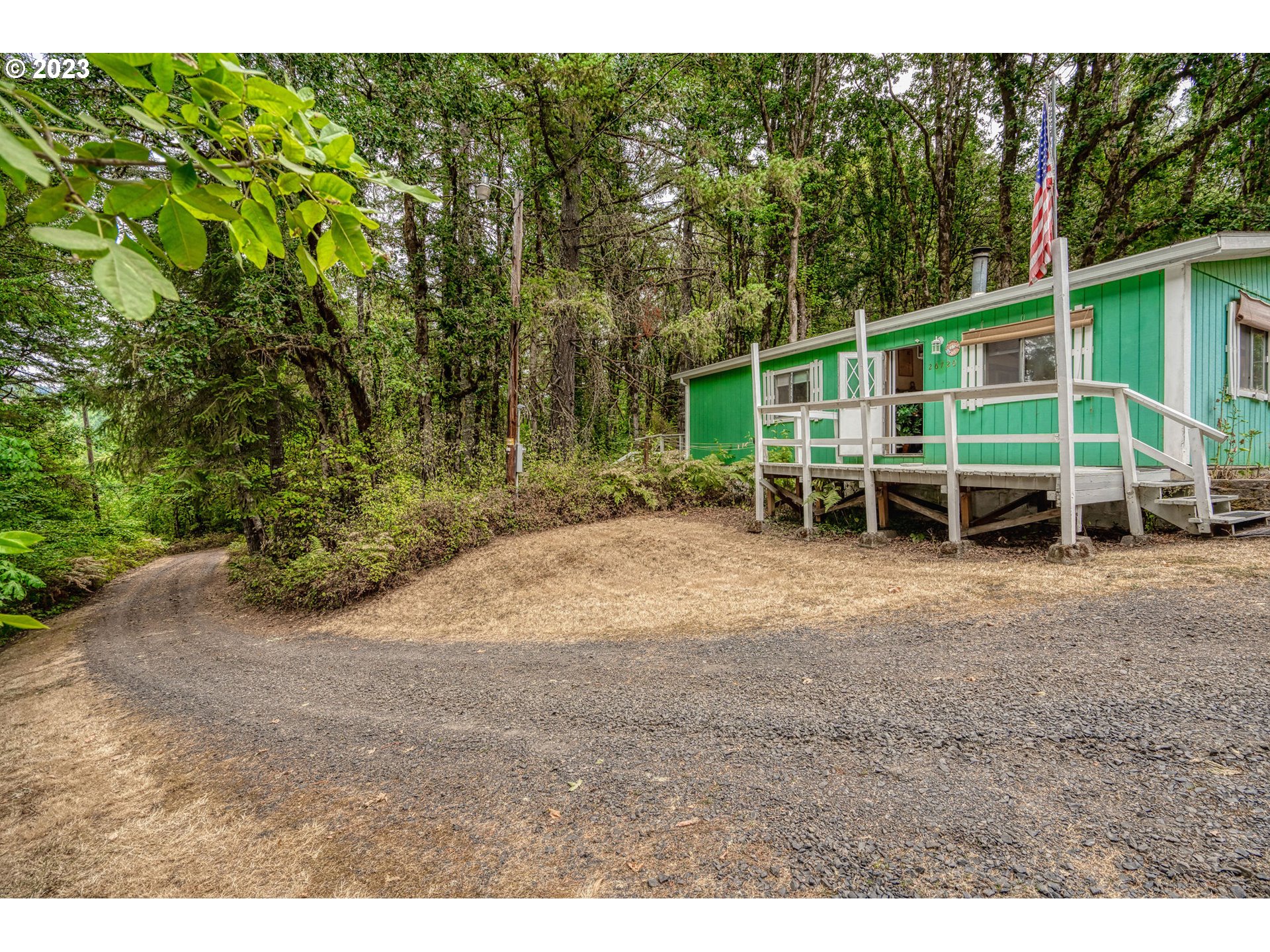 26720 Northwest Williams Canyon Road Gaston, OR 97119 - Photo 3 of 33 a view of a house with a yard