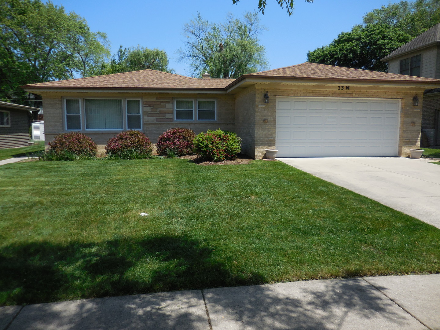 33 North Rammer Avenue Arlington Heights, IL 60004 - Photo 1 of 1 a front view of house with yard and green space