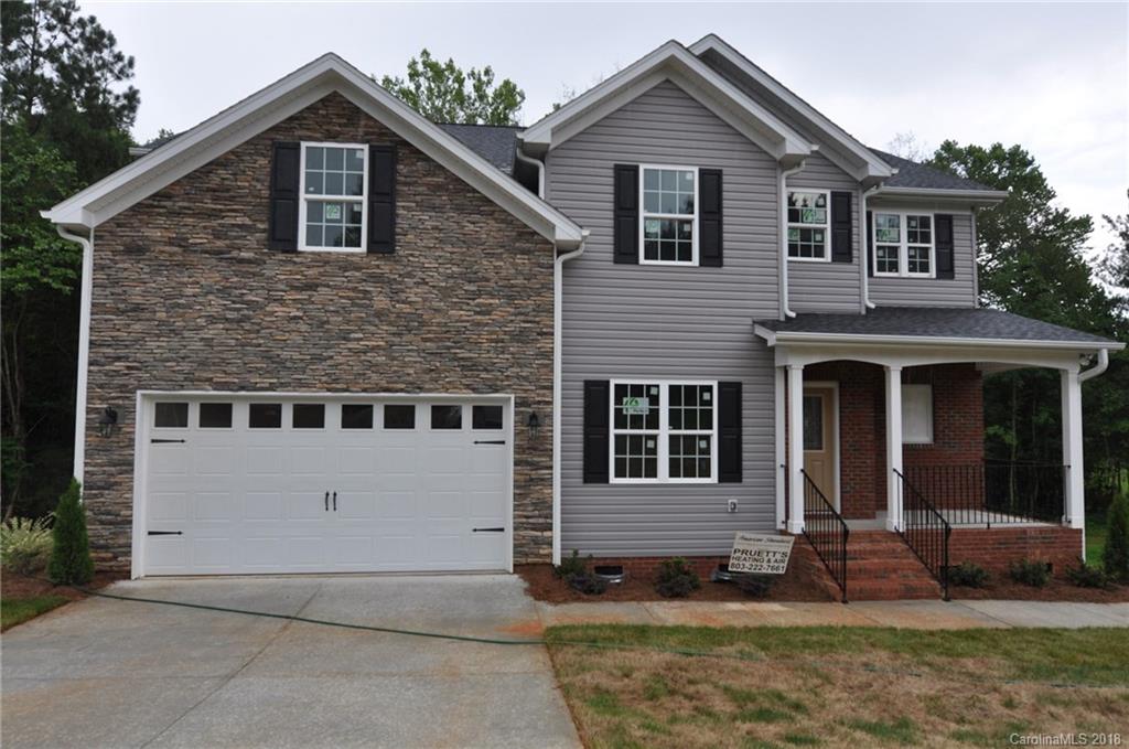 4081 Ruston Creek Road, Unit 83 Catawba, SC 29704 - Photo 1 of 27 a front view of a house with a yard