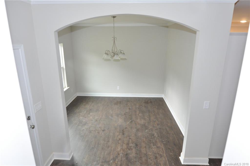 4081 Ruston Creek Road, Unit 83 Catawba, SC 29704 - Photo 2 of 27 an empty room with a mirror
