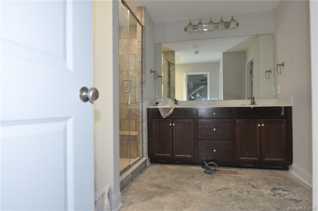4081 Ruston Creek Road, Unit 83 Catawba, SC 29704 - Photo 21 of 27 a bathroom with a sink and a mirror