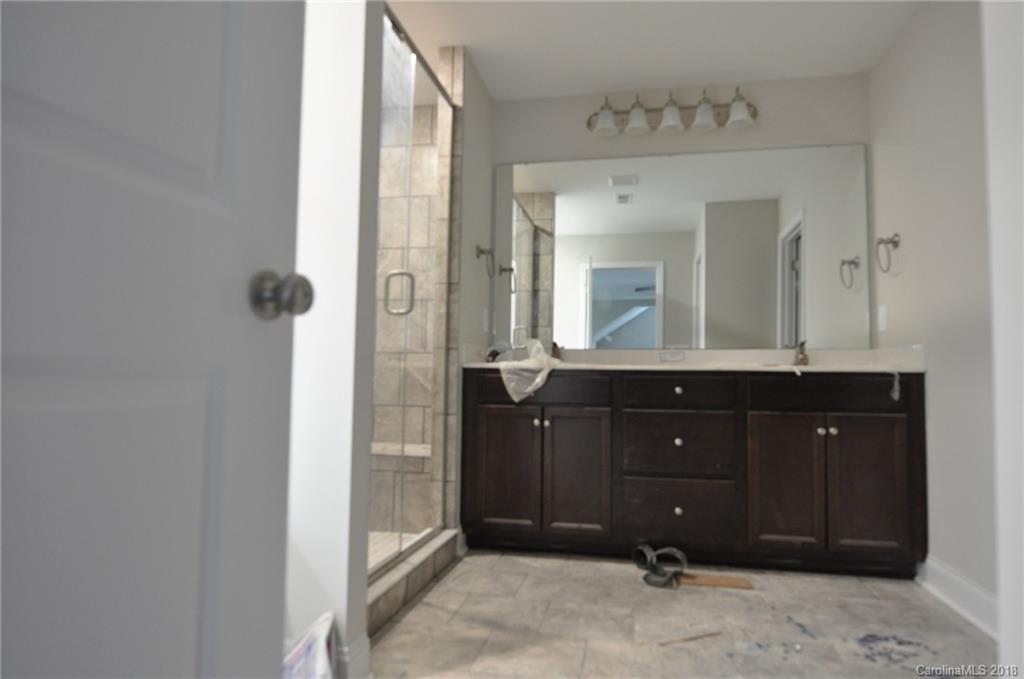 4081 Ruston Creek Road, Unit 83 Catawba, SC 29704 - Photo 22 of 27 a bathroom with a sink and a mirror