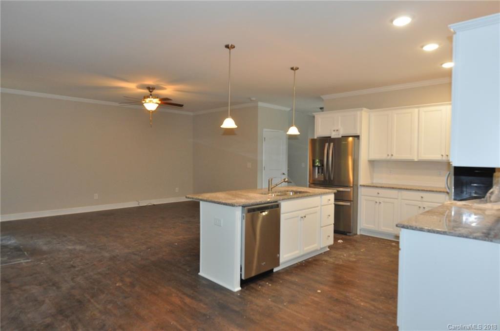 4081 Ruston Creek Road, Unit 83 Catawba, SC 29704 - Photo 8 of 27 a kitchen with a sink cabinets and wooden floor