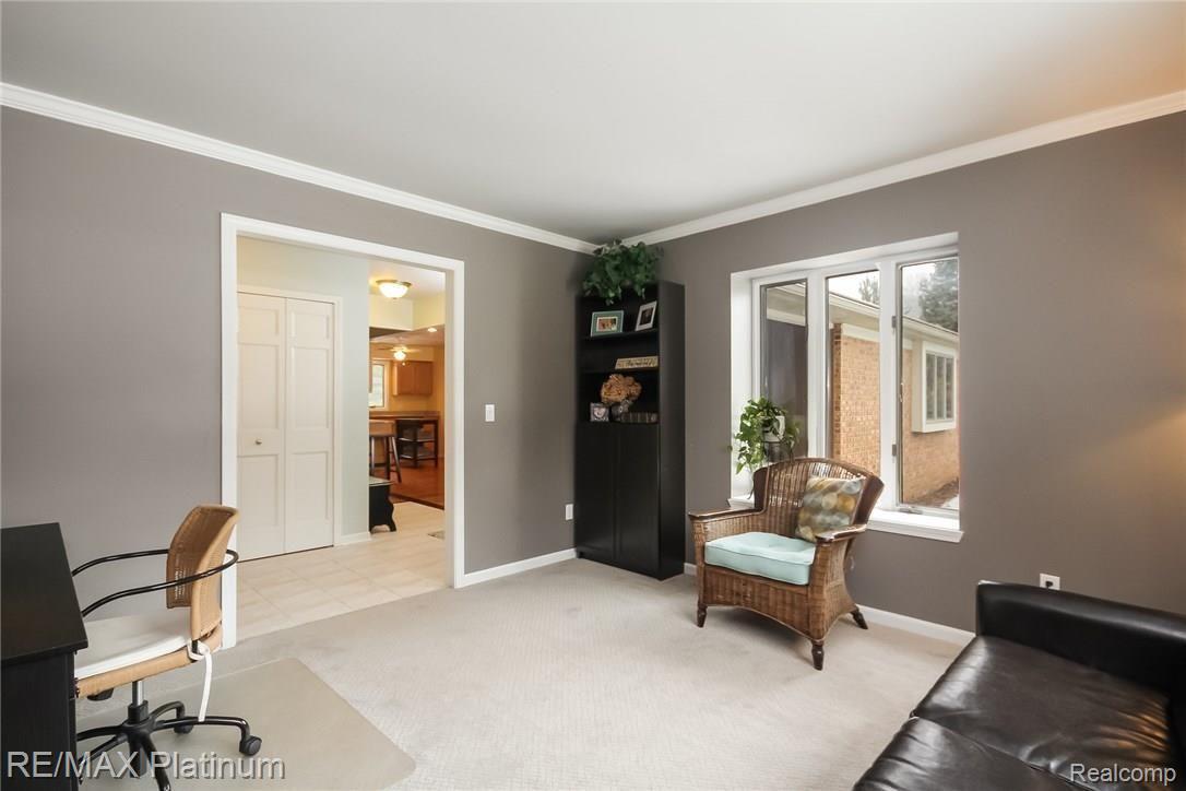 4047 Timberview Drive Howell, MI 48843 - Photo 5 of 59 View back toward foyer, notice the crown moulding in this room
