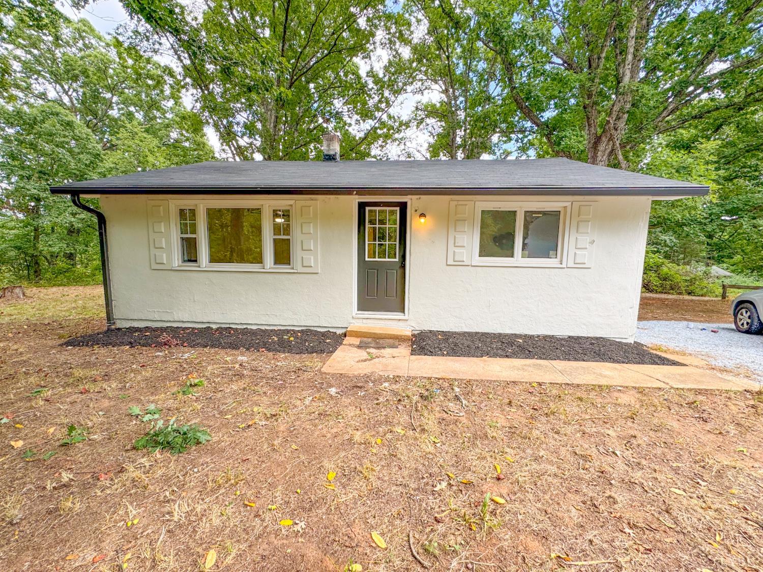 front view of a house with a yard