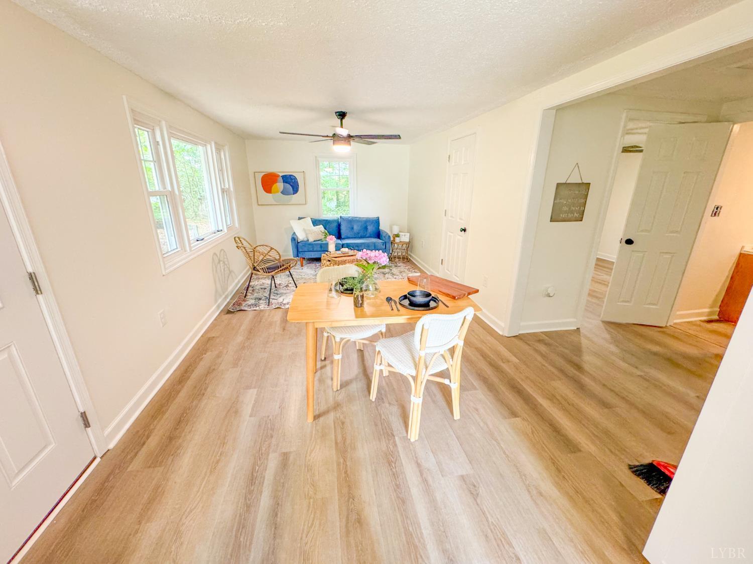 684 East Ferry Road Gladys, VA 24554 - Photo 11 of 20 a view of a dining room with furniture window and wooden floor