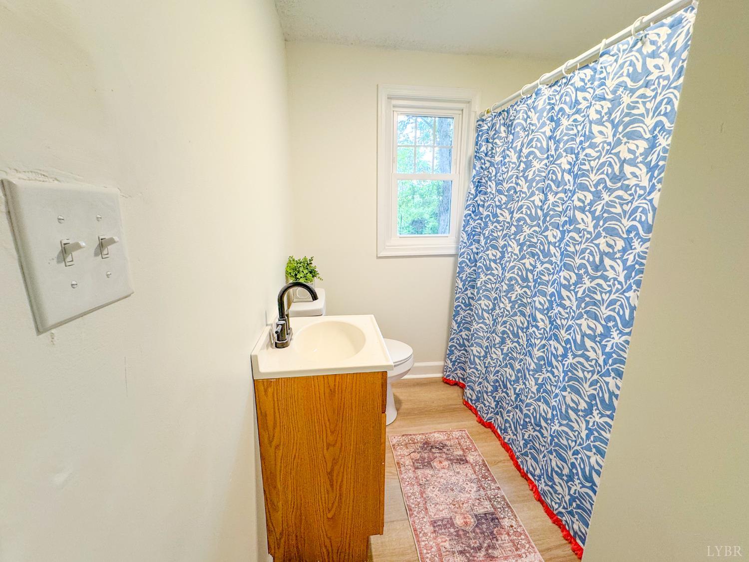 684 East Ferry Road Gladys, VA 24554 - Photo 13 of 20 a bathroom with a sink and mirror