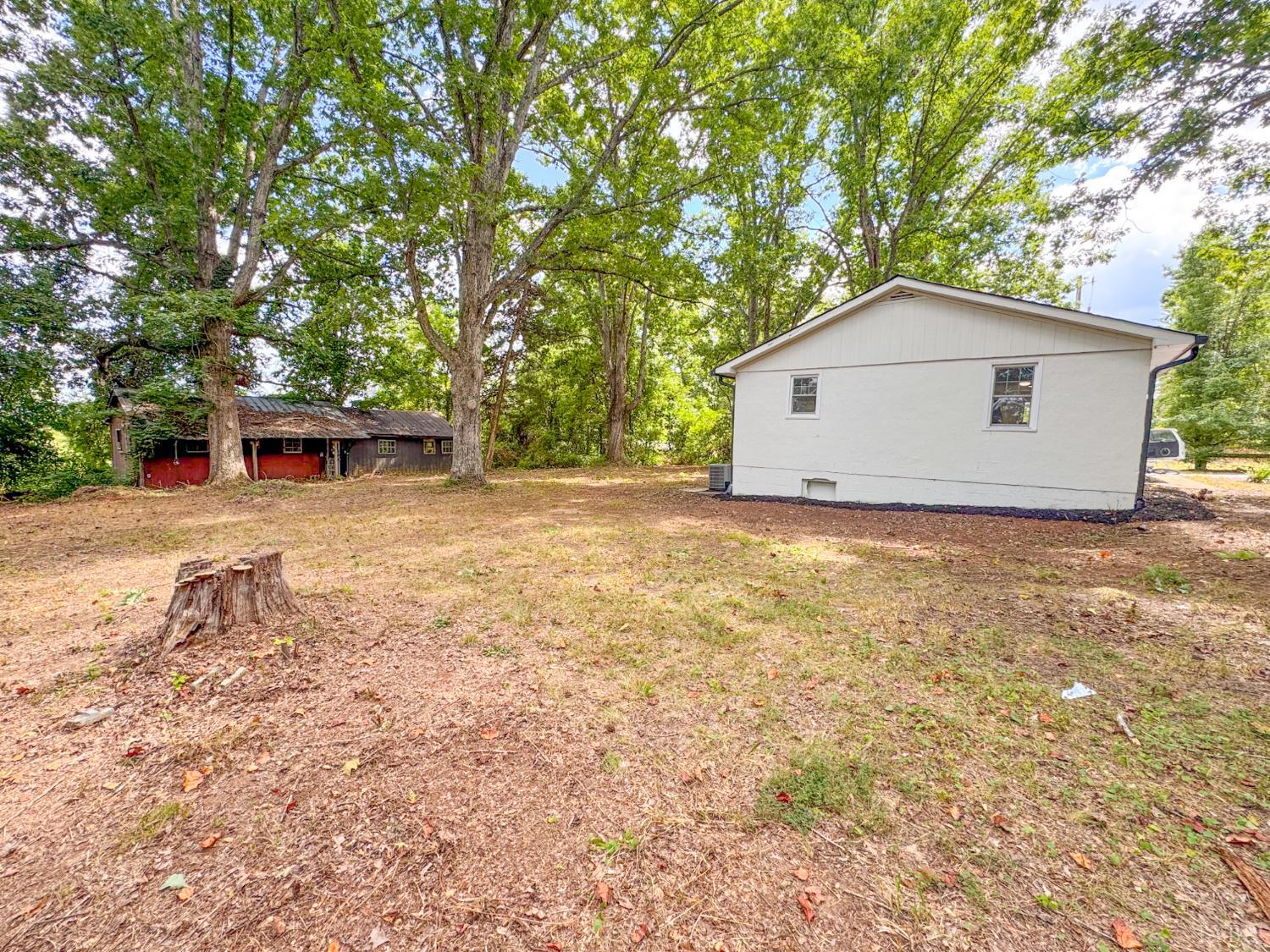 684 East Ferry Road Gladys, VA 24554 - Photo 17 of 20 a view of a house with a yard and large tree
