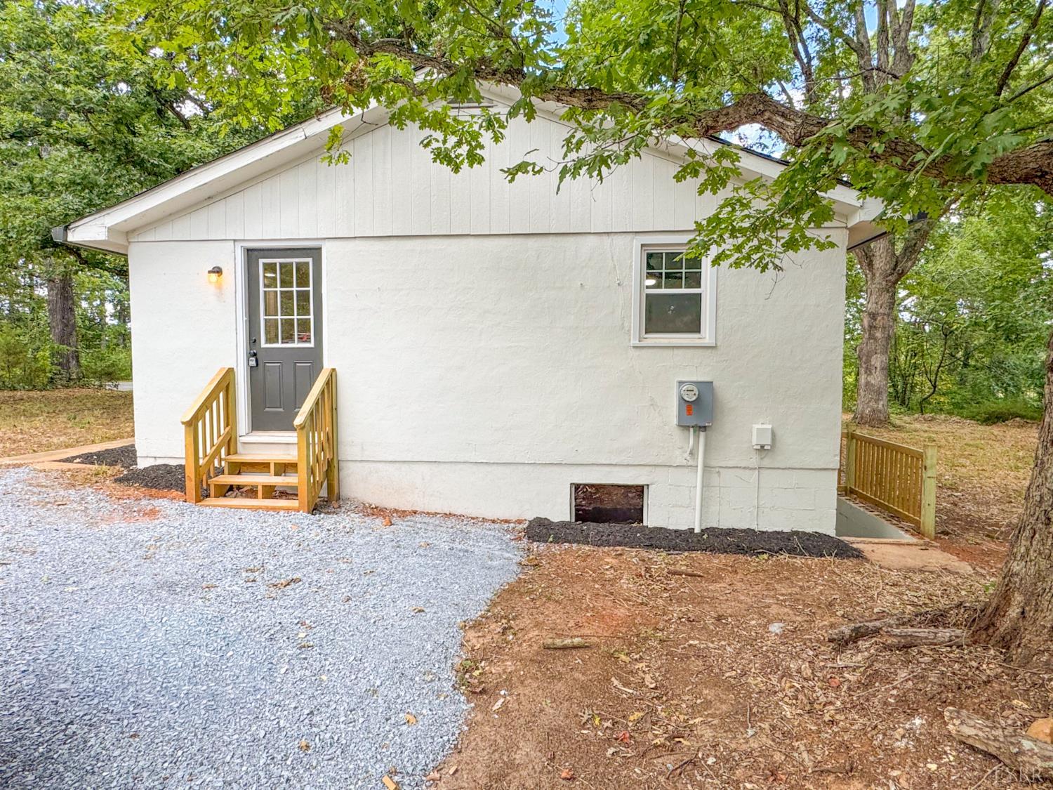 684 East Ferry Road Gladys, VA 24554 - Photo 18 of 20 a backyard of a house with table and chairs