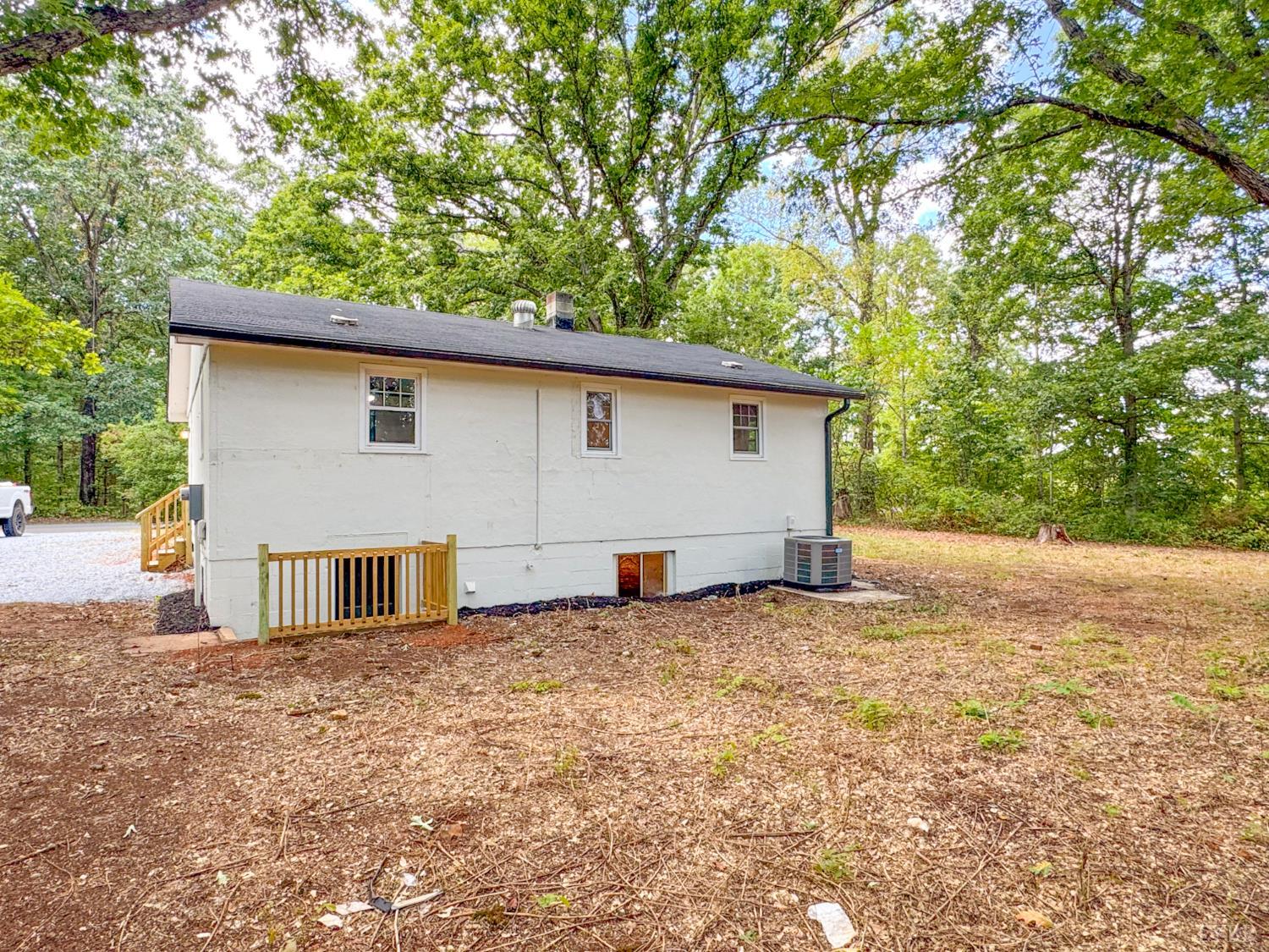 684 East Ferry Road Gladys, VA 24554 - Photo 19 of 20 a white house that has a tree in front of it