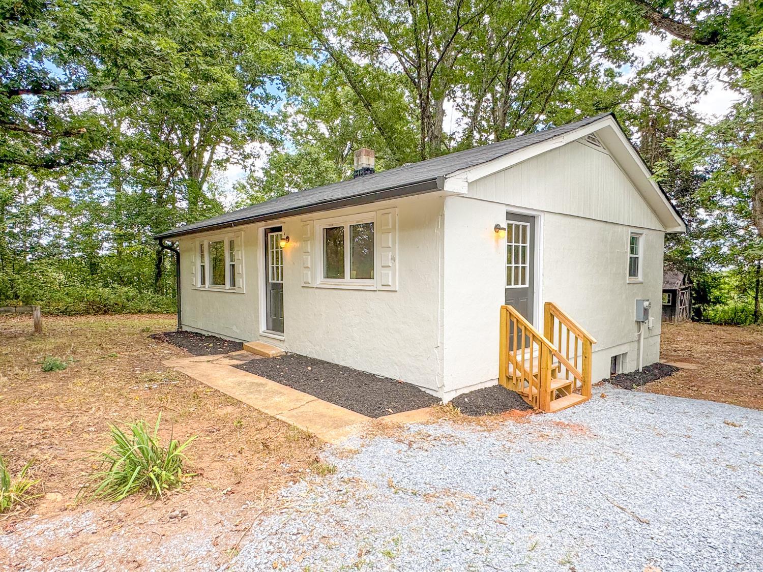 684 East Ferry Road Gladys, VA 24554 - Photo 20 of 20 a view of a house with a yard and garage