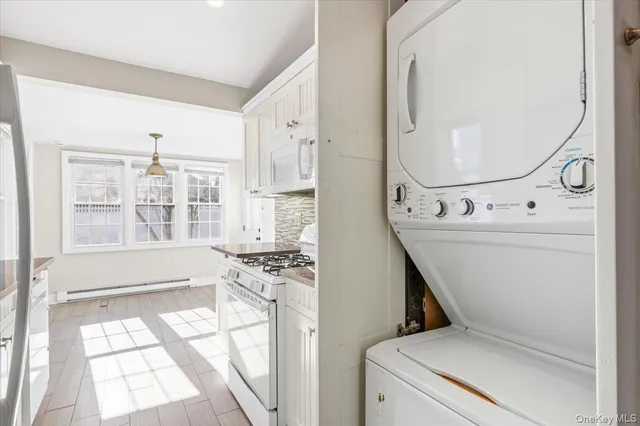 a view of washer and dryer in a livingroom