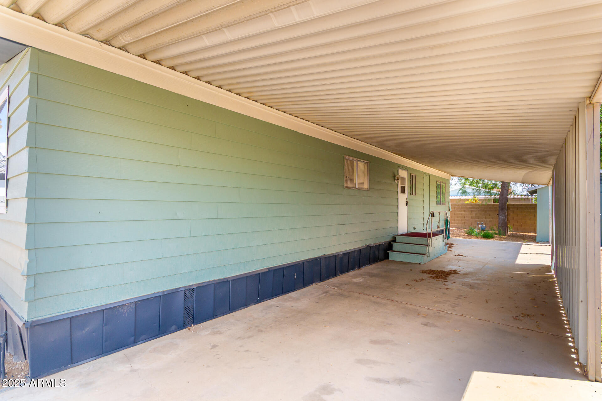 2945 West 9th Place Apache Junction, AZ 85120 - Photo 20 of 23 a view of a backyard with seating space