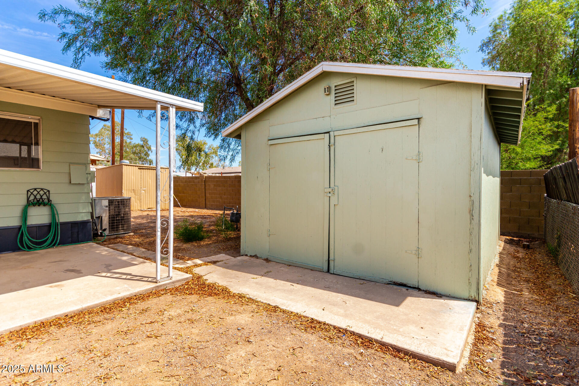 2945 West 9th Place Apache Junction, AZ 85120 - Photo 21 of 23 a view of a house with a backyard