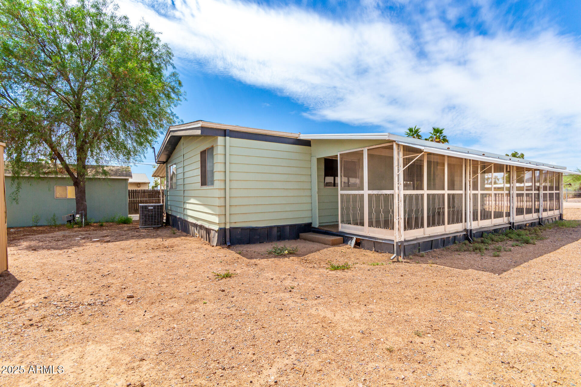 2945 West 9th Place Apache Junction, AZ 85120 - Photo 23 of 23 a view of a house with a yard