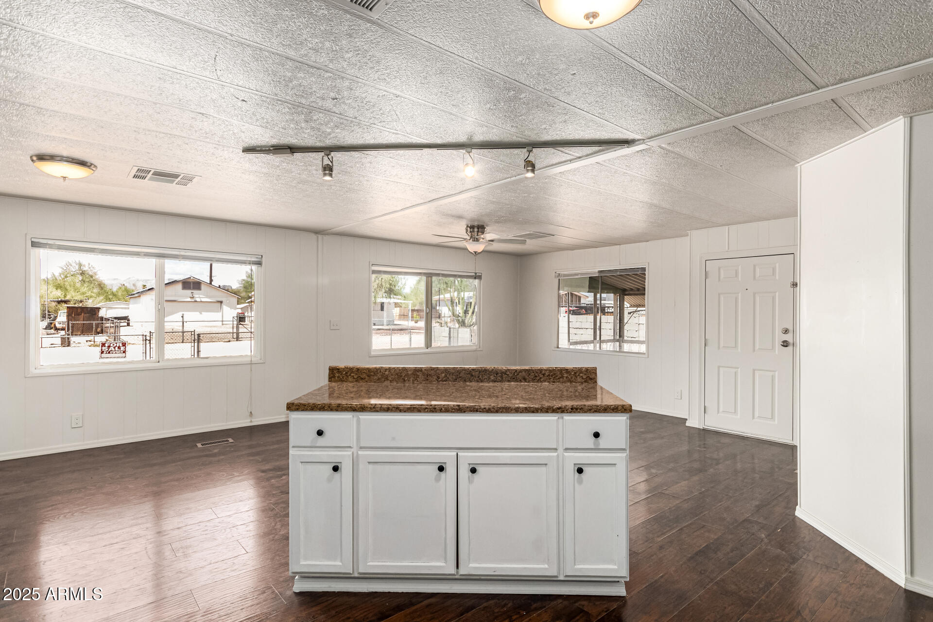 2945 West 9th Place Apache Junction, AZ 85120 - Photo 8 of 23 a view of kitchen with granite countertop cabinets and window