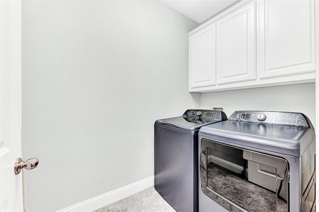 1313 Torrington Lane Forney, TX 75126 - Photo 18 of 21 a utility room with dryer and washer