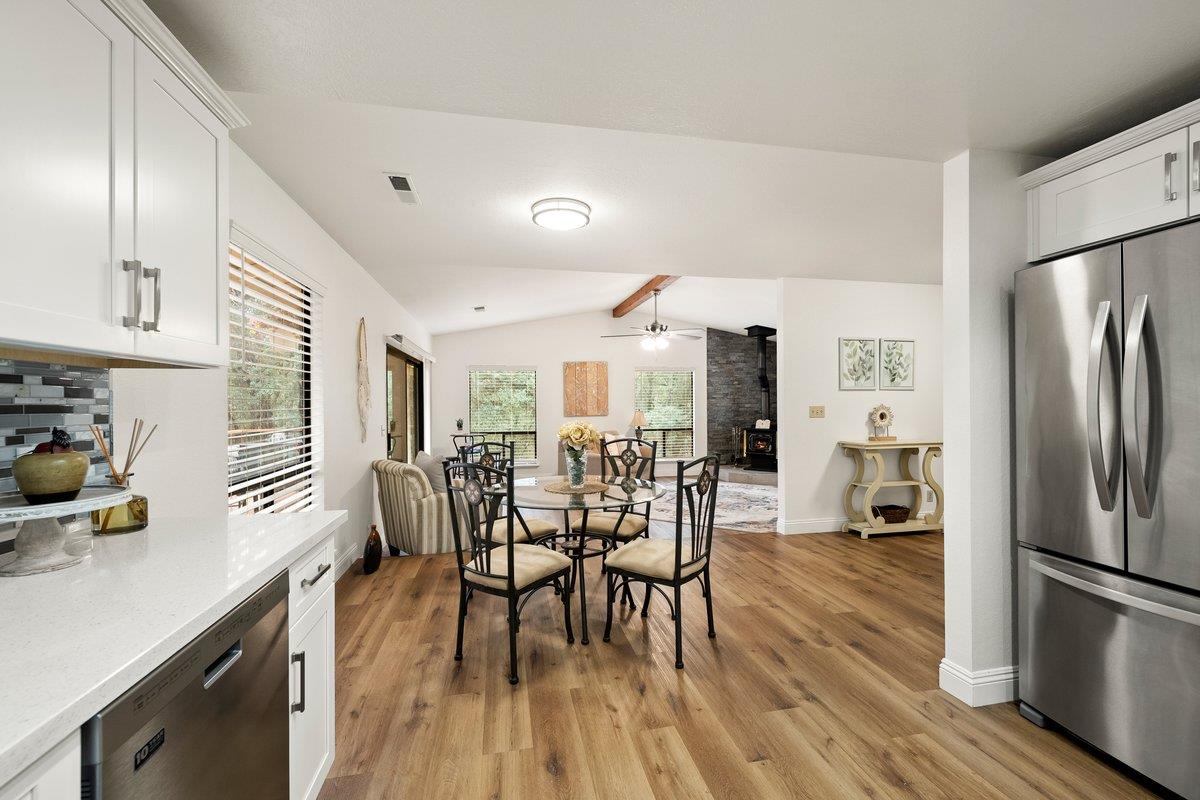 6561 Trinity Way Placerville, CA 95667 - Photo 29 of 58 a view of a dining room with furniture window and wooden floor
