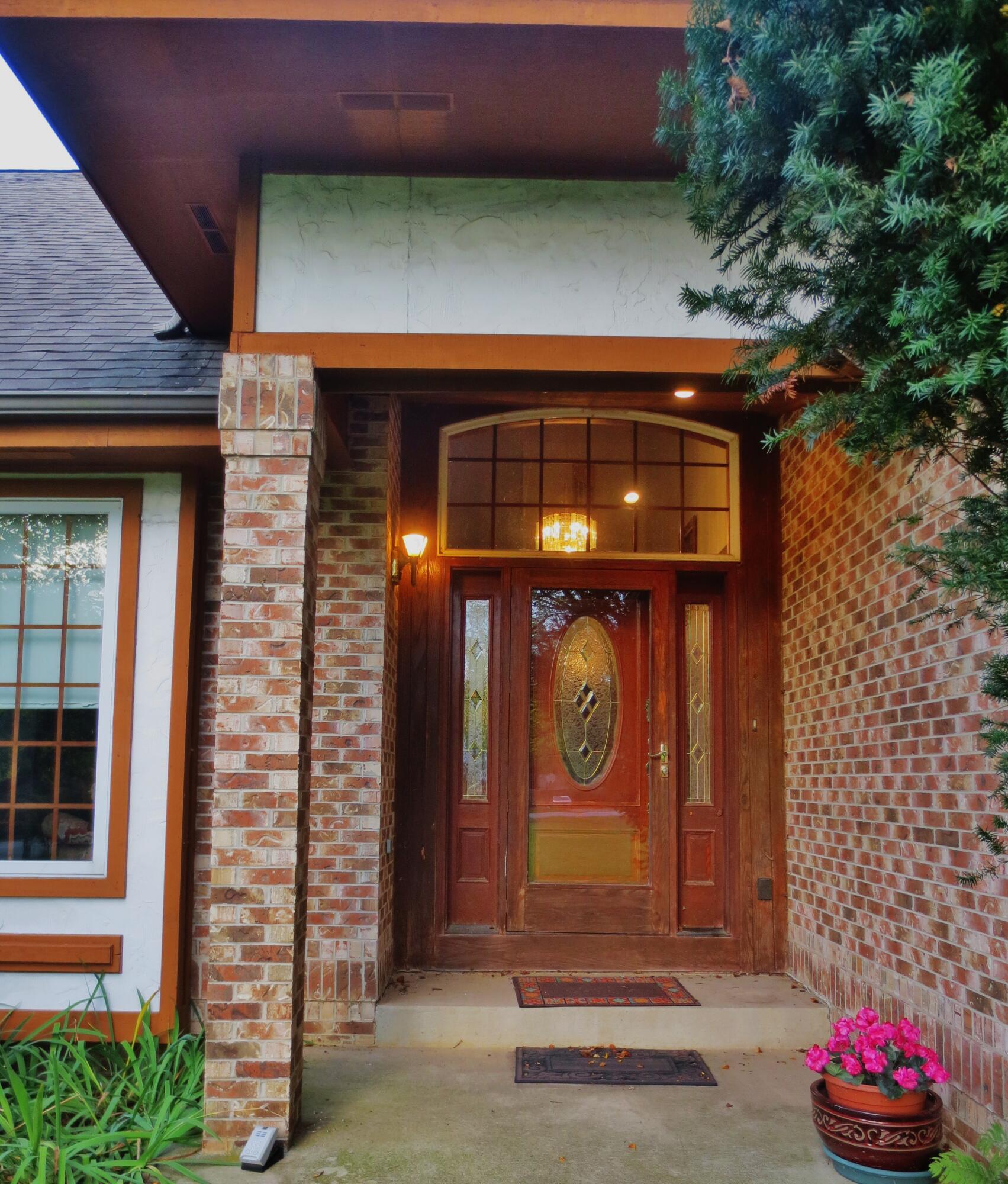 643 North 50 West Valparaiso, IN 46385 - Photo 6 of 62 a front view of a house with entryway