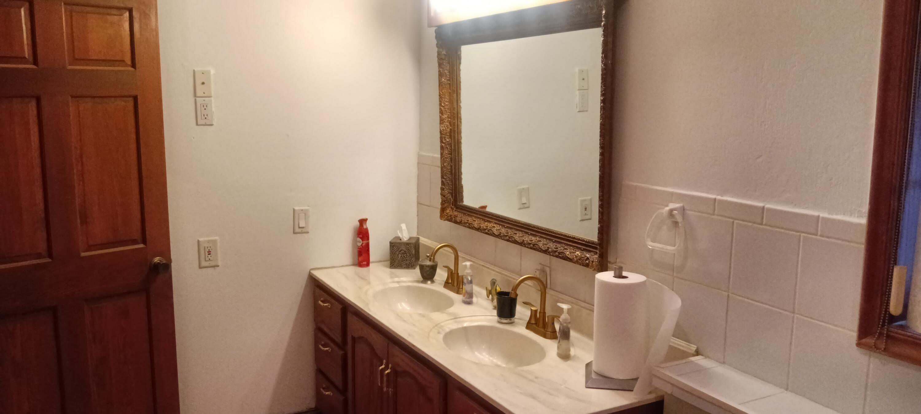 643 North 50 West Valparaiso, IN 46385 - Photo 65 of 69 a bathroom with a sink and a mirror