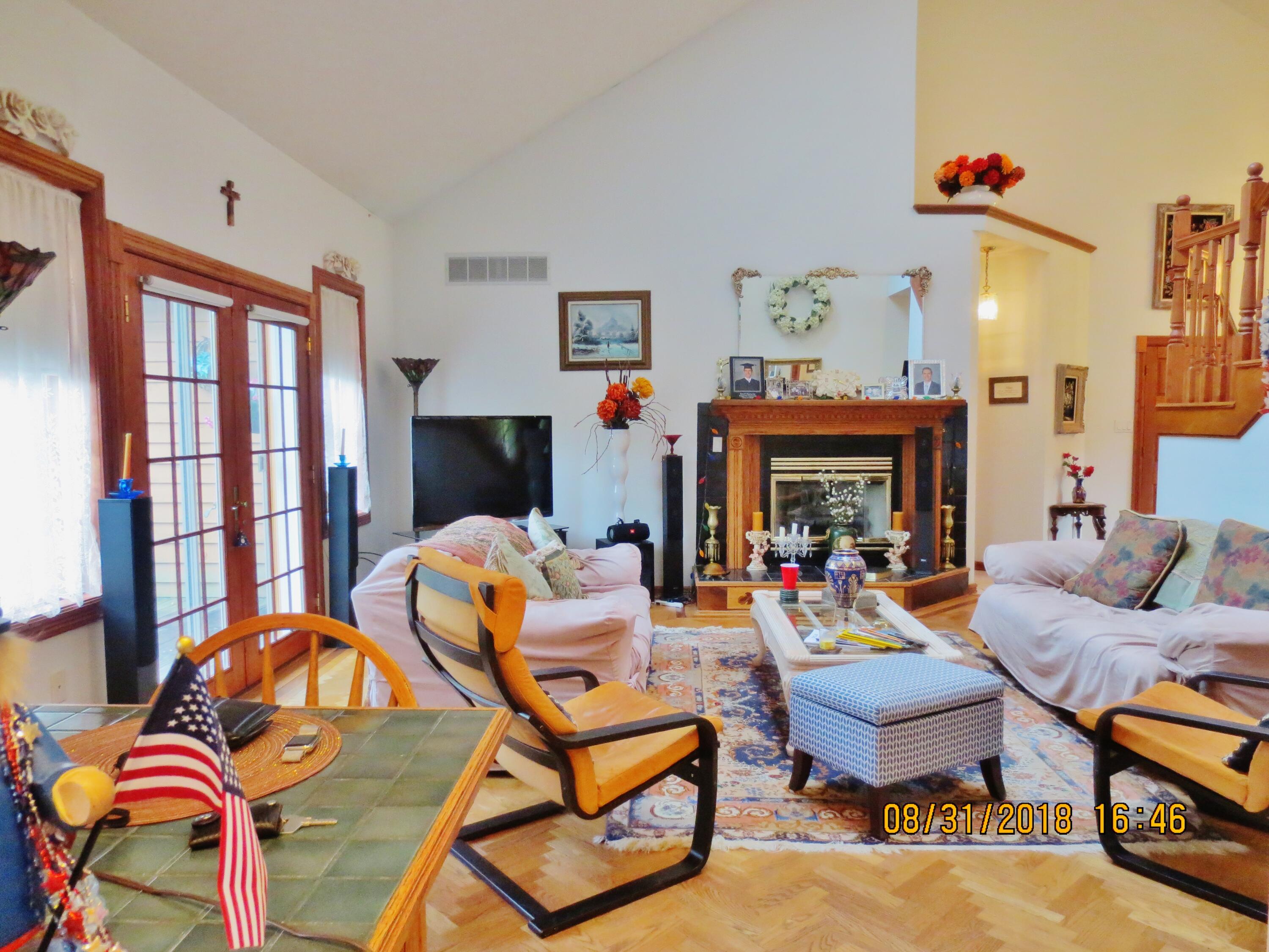 643 North 50 West Valparaiso, IN 46385 - Photo 69 of 69 a living room with furniture a fireplace and a large window