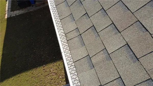 a stove top oven sitting inside of a kitchen