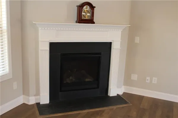 a view of a dining room with furniture and window