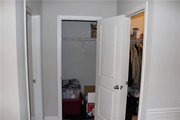 a bathroom with a mirror sink and shower